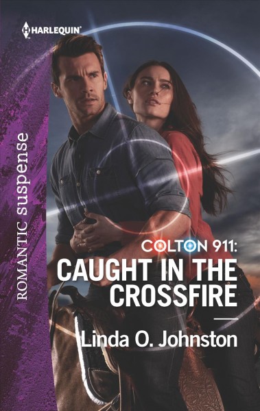 Colton 911 : caught in the crossfire / Linda O. Johnston.